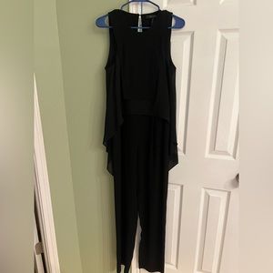 Open back jumpsuit. Very elegant.